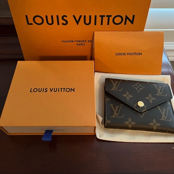 SOLD Authentic Louis Vuitton Victorine wallet - Picture 1 of 10
